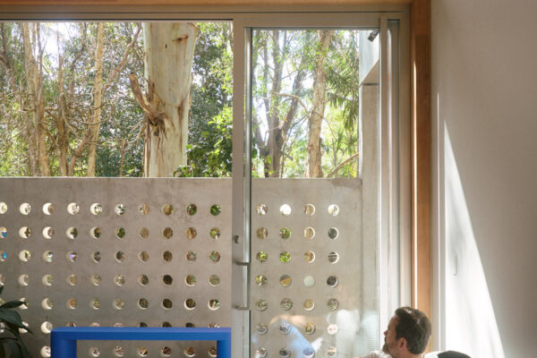 Fliteboard Office Fitout in Byron Bay, featuring polished concrete floors and double-height glazing.