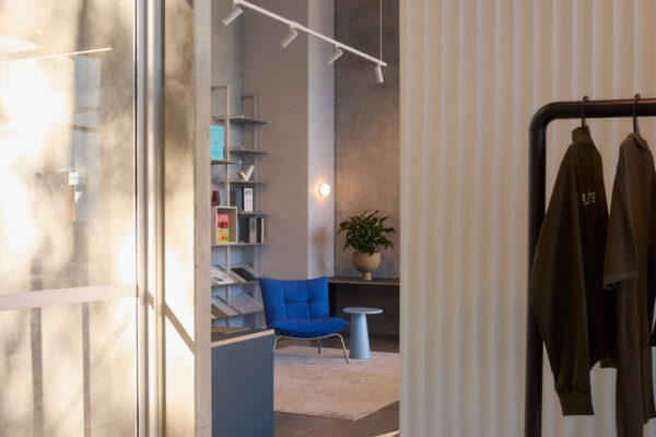 Fliteboard Office Fitout in Byron Bay, featuring polished concrete floors, display fixtures, soft furnishings and refined industrial detailing.